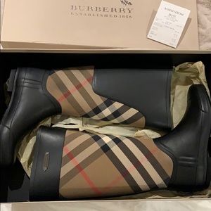 BURBERRY rain boots.